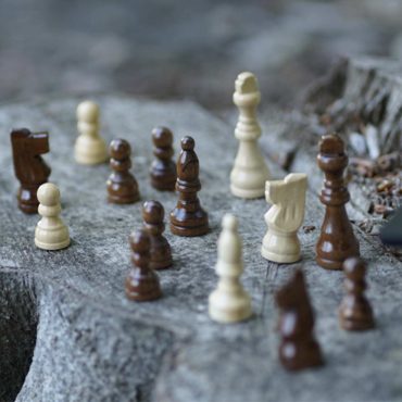 Teamentwicklung Methoden, Teamfusion, Schachfiguren zusammengestellt