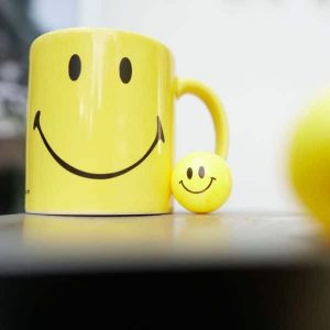 Kundenorientiertes Verhalten, Freundlichkeit, Smiley-Tasse